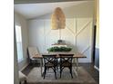 Cozy dining room featuring modern decor, ample natural light, and comfortable seating for intimate meals at 11115 Sw 54Th Cir, Ocala, FL 34476