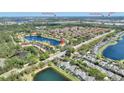 Community aerial view showcases proximity to lush greenery and popular destinations including Disney theme parks at 3101 Yellow Lantana Ln, Kissimmee, FL 34747