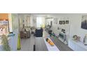 Bright and airy living area with an open floor plan and ample natural light at 645 Captiva Cir, Kissimmee, FL 34741