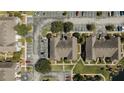 Overhead view of the residences, showcasing organized parking, green spaces, and well-maintained landscaping at 9061 Lee Vista Blvd # 1303, Orlando, FL 32829
