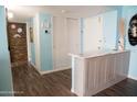 This light and airy foyer features neutral decor and sleek, modern flooring at 2800 N Atlantic Ave # 1411, Daytona Beach, FL 32118