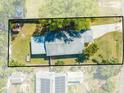 Aerial view showcasing the home's layout, yard, and neighborhood at 1211 Shawnee Dr, Kissimmee, FL 34744