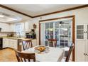 Eat-in kitchen featuring updated appliances and a view to the back patio at 2429 Oak Run Blvd, Kissimmee, FL 34744