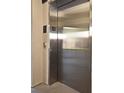 Modern steel elevator with ground floor access for easy accessibility at 1230 Wright Cir # 5309, Celebration, FL 34747