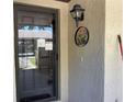 Inviting condo front door and welcoming decoration at 2246 Firestone Pl, Winter Haven, FL 33884