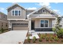 Beautiful two-story home with a well-manicured lawn and attached two car garage, perfect for suburban living at 2967 Gavin Sky Dr, Kissimmee, FL 34744
