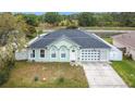 Charming single-story home boasting a well-kept lawn and a convenient attached garage at 1167 Saint Tropez Ct, Kissimmee, FL 34759