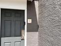 A close-up of the front door with visible unit number and entry details at 3100 Parkway Blvd # 113, Kissimmee, FL 34747