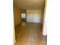 Spacious living room featuring tile flooring and natural light at 448 Cinnamon Dr, Kissimmee, FL 34759