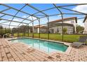 Large screened-in pool offers lots of space for swimming, lounging and entertaining at 16621 Caribbean Breeze Way, Clermont, FL 34714