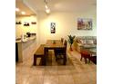 Open dining area with bench seating, seamlessly connecting the living spaces at 2610 Lodi Cir # 104, Kissimmee, FL 34746