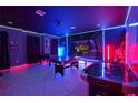 Awesome game room with Star Wars theme, LED lighting, and various gaming tables at 4213 Paragprah St, Kissimmee, FL 34746