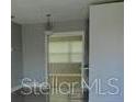 Neutral bedroom with closet and bright window at 5017 Steyr St, Orlando, FL 32819