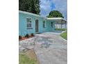 Charming exterior of home with carport at 5017 Steyr St, Orlando, FL 32819