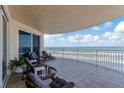 Relax on this covered balcony with seating and gorgeous views of the ocean at 2403 S Atlantic Ave # 501, Daytona Beach Shores, FL 32118