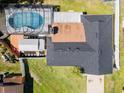 Aerial view showing the backyard pool and deck of this single Gathering home at 2506 Bali Cir, Kissimmee, FL 34741