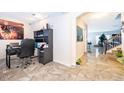 Bright office space with a modern desk and tile floors, perfect for remote work at 3252 Toscana Dr, St Cloud, FL 34772