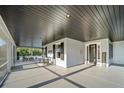Inviting front porch with comfortable seating, perfect for relaxing outdoors at 4561 Henry J Ave, St Cloud, FL 34772