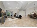 Spacious living room showcases tile floors, recessed lighting, and stylish decor at 9509 Baycliff Ct, Orlando, FL 32836