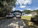 Charming single-story home featuring well-maintained landscaping and an attached garage at 6922 Doehring Dr, Lakeland, FL 33810