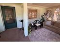 Cozy sunroom with comfortable seating, natural light, and a tranquil atmosphere at 406 E Grove Ave, Lake Wales, FL 33853