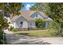This beautiful home boasts a charming exterior with mature trees and a long driveaway at 6200 Alligator Lake E Shr, St Cloud, FL 34771