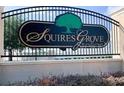 Squires Grove community entrance sign with decorative iron gate and lush greenery at 1104 Star Ruby Ln, Winter Haven, FL 33880