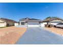 Attractive single-Gathering home with a spacious driveway and well-kept landscaping at 121 Lochness Ln, Kissimmee, FL 34743