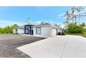 Beautiful one-story home featuring a white concrete driveway and attached garage at 19182 Seaview St, Orlando, FL 32833