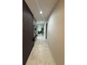 Bright hallway with decorative wall accents and recessed lighting at 209 Citrus Pointe Dr, Haines City, FL 33844