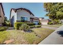 A lovely single-Gathering home featuring a well-manicured lawn and a paved sidewalk at 5118 Tiber Way, St Cloud, FL 34771