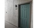View of entrance door to unit 103 at 2130 Cascades Blvd # 108, Kissimmee, FL 34741