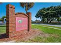 Welcome to Mill Run, a neighborhood of families, with a brick sign and manicured lawn at 2430 Mill Run Blvd, Kissimmee, FL 34744