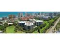 An aerial view of the condo in Daytona Beach, Florida shows its proximity to the beach and other buildings at 4 Oceans West Blvd # 301B, Daytona Beach Shores, FL 32118