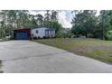 View of the exterior elevation of the home at 3669 General Marshall Rd, Daytona Beach, FL 32124