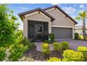 Inviting front porch with brick pavers and comfortable seating, adding a touch of charm to the home's exterior at 1014 Umbria Dr, Kissimmee, FL 34759