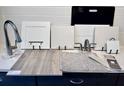 This shot showcases the material options available when choosing interior finishes for your new home at 1067 Cloud Ridge Ct, Mount Dora, FL 32757