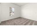Neutral bedroom with carpet floors, window, and bright walls at 4928 Worchester Dr, Kissimmee, FL 34746