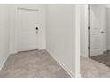 Bright foyer with neutral walls and floors leading to other rooms at 4928 Worchester Dr, Kissimmee, FL 34746