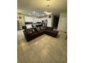 Open-concept living room and kitchen area, perfect for entertaining and Gathering gatherings at 748 Citrus Isle Dr, Davenport, FL 33837