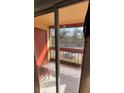 View from covered outdoor patio with sliding glass doors, offering natural light and outdoor connection at 2804 N Powers Dr # 31, Orlando, FL 32818