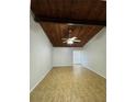 A bright living room with a wood paneled ceiling and a ceiling fan at 200 Maitland Ave # 80, Altamonte Springs, FL 32701