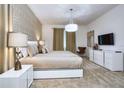 Comfortable main bedroom with a large bed, stylish furnishings, and a relaxing atmosphere at 2649 Calistoga Ave, Kissimmee, FL 34741