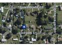 Aerial view of neighborhood, showing the layout with surrounding streets and properties at 2947 Larson St, Kissimmee, FL 34741
