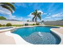 Sparkling pool and spa surrounded by a patio, perfect for outdoor entertaining at 3101 Drema Dr, St Cloud, FL 34769