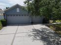 Spacious three car garage with plenty of parking and storage space at 3638 Doe Run Dr, St Cloud, FL 34772