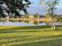 Beautiful backyard pond view, perfect for relaxing and enjoying nature at 3638 Doe Run Dr, St Cloud, FL 34772