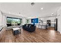 Bright and airy living room seamlessly connects to the kitchen, ideal for modern living at 438 Marcello Blvd, Kissimmee, FL 34746