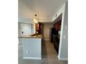 Modern kitchen with granite countertops, stainless steel appliances, and hardwood flooring at 5160 Conroy Rd # 26, Orlando, FL 32811