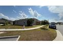 A well maintained exterior of the house with nice landscaping at 5624 Beggs Rd, St Cloud, FL 34771